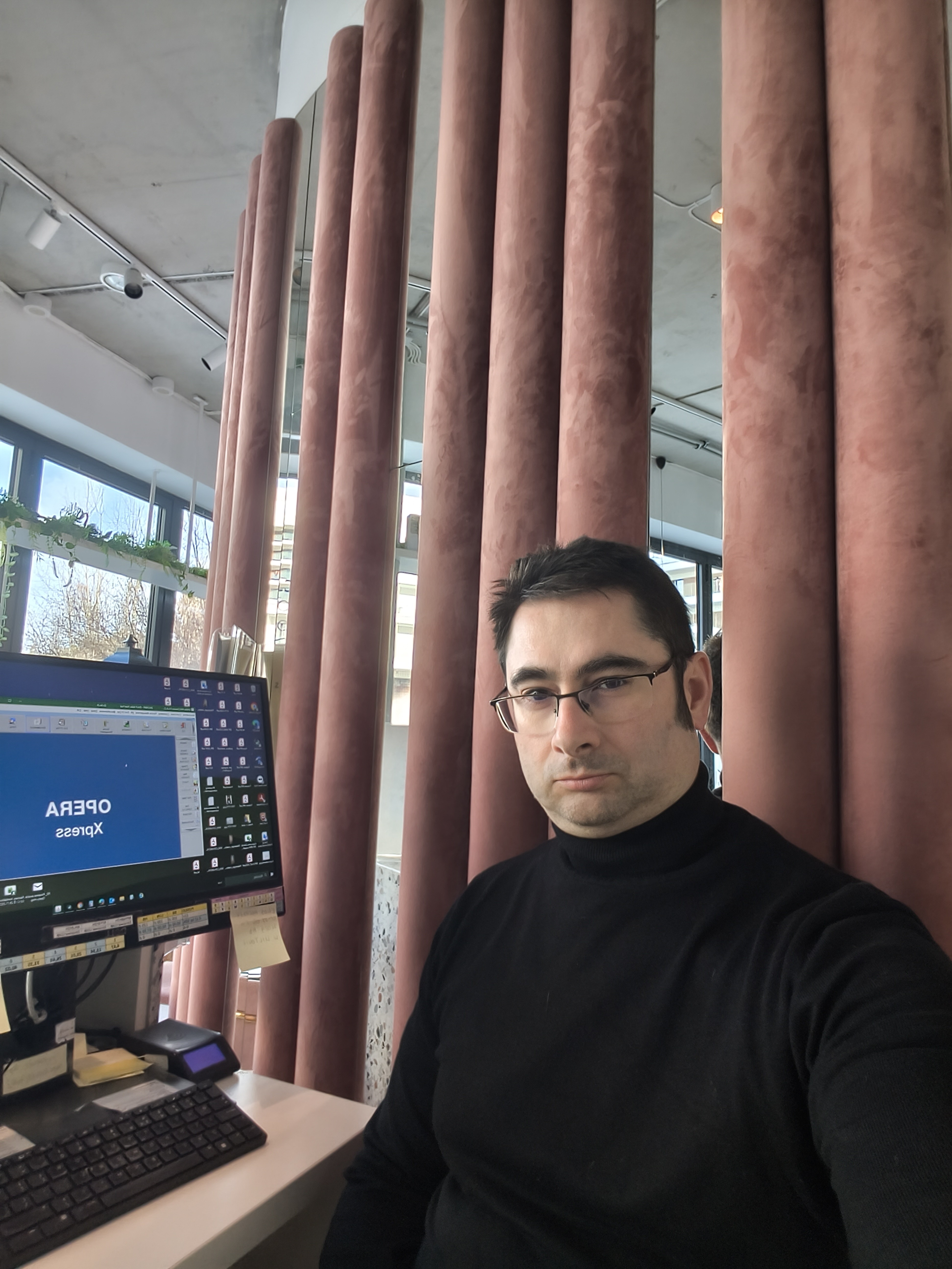 Łukasz in black turtleneck — the editorial gaze